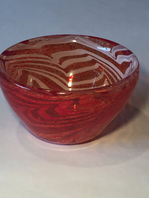 BOWL-RED WITH WHITE SWIRLS INSIDE